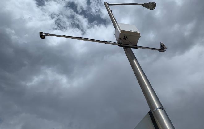 A weather sensor attached to a streetlight