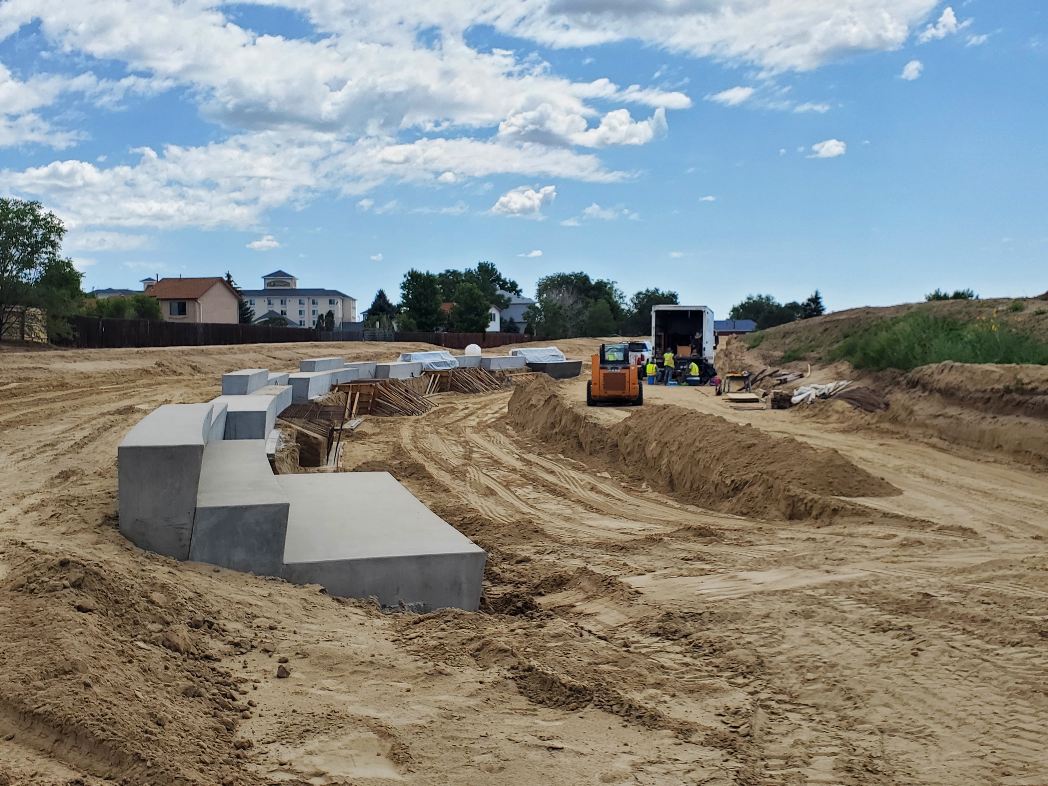 Concrete being set for field seating area