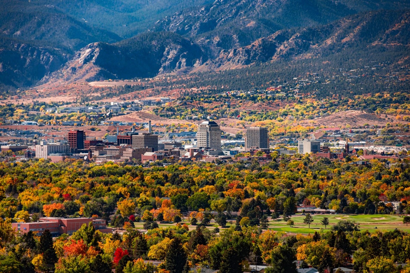 autumn colored trees and downtown Colorado Springs 