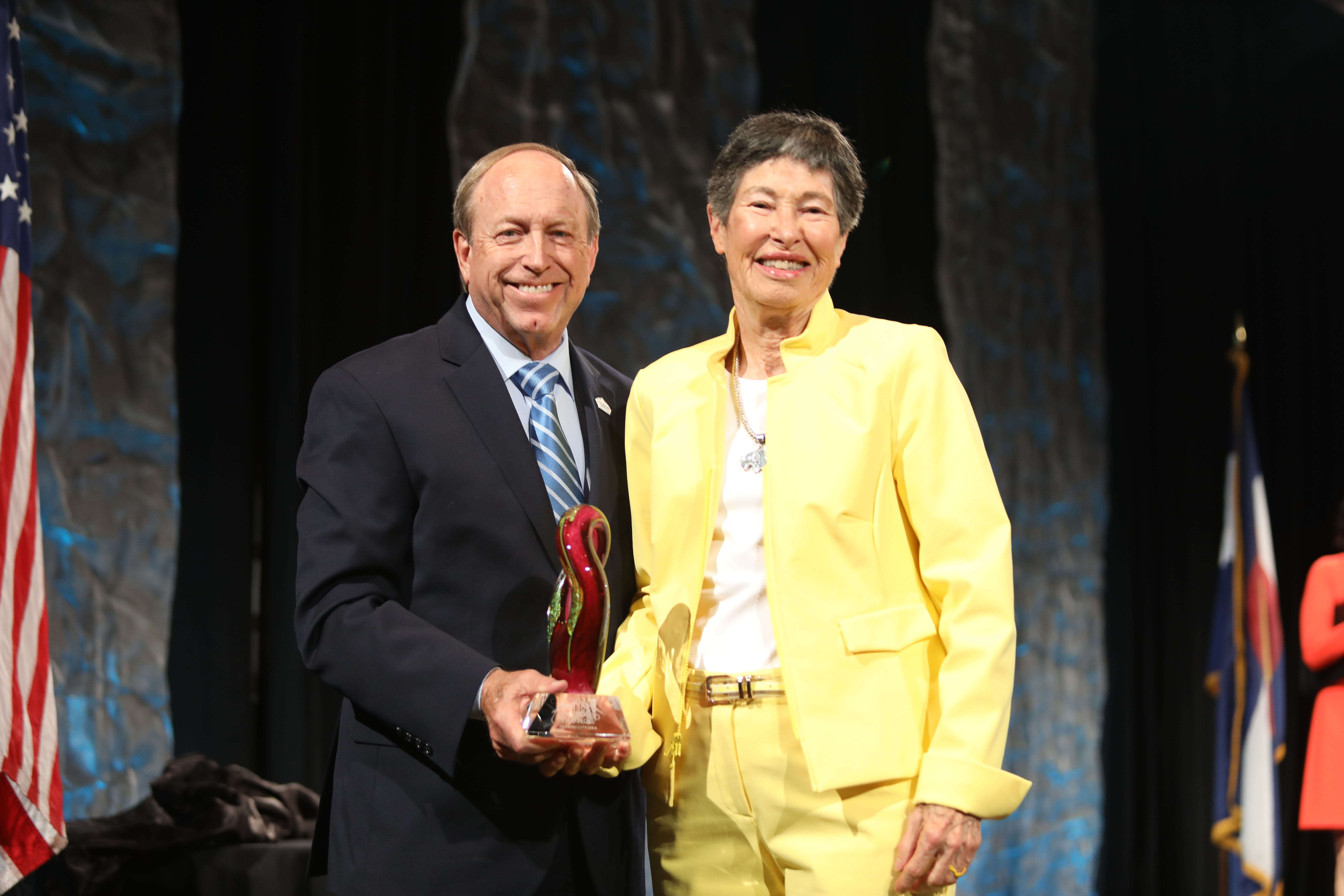 Mayor John Suthers and Lyda Hill with her Lifetime Achievement Award