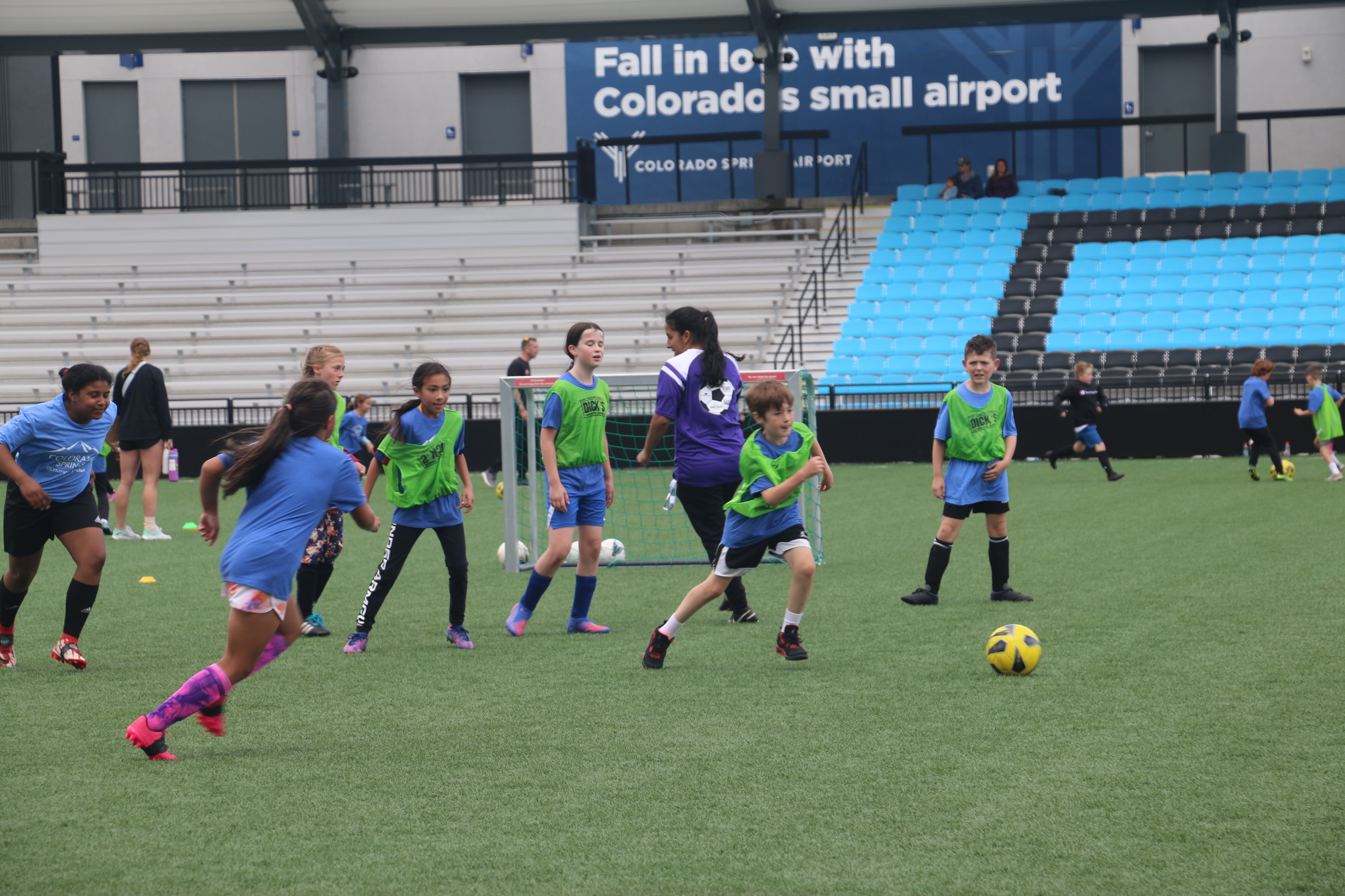 Children participate in a field day soccer game