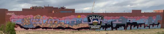 'Community' mural on the Police Operations Center building