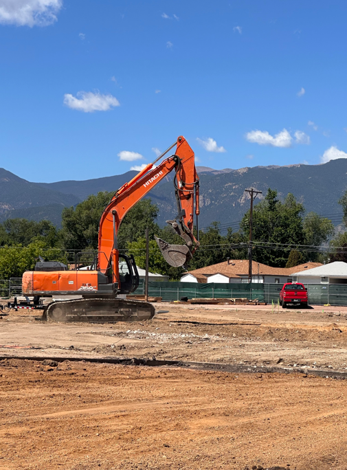 A crane begins demolishing the old colorado springs senior center