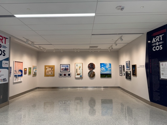 The Art at COS: Window Seat - Views from the Stratosphere gallery at Colorado Springs Airport.