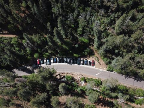 aerial view of cars parked in the new Mt. Cutler trailhead parking lot