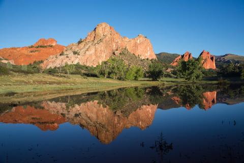 A picture of rocks at Garden of the Gods in front of water