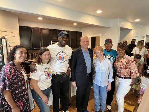 Mayor Yemi stands with Governor Jared Polis, Abbey Mobolade and other community leaders during the 1,000 neighborhood gatherings kickoff