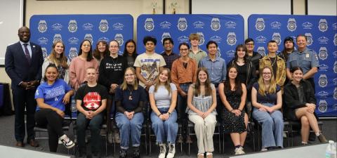 Group of Teenagers Posing with The Chief of Police and Mayor for Youth Advisory Council