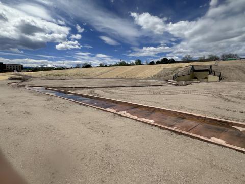 The completed water channel pictured connects both reservoirs to a smaller water detention pool.