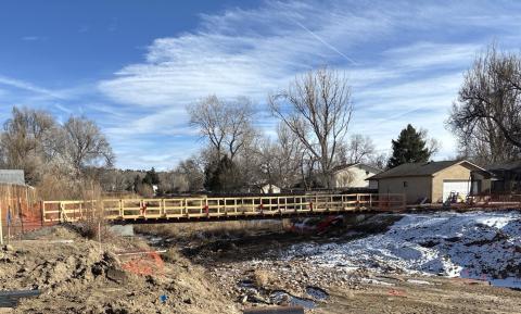 The temporary pedestrian crossing in place until the bridge construction is complete.