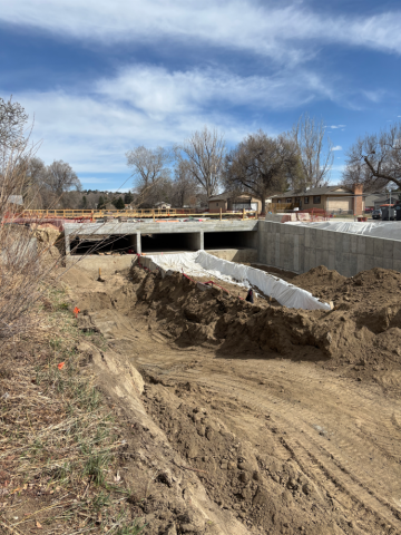 The concrete structure under the bridge on Hopeful Drive being constructed to support heavy weight and manage water flow.