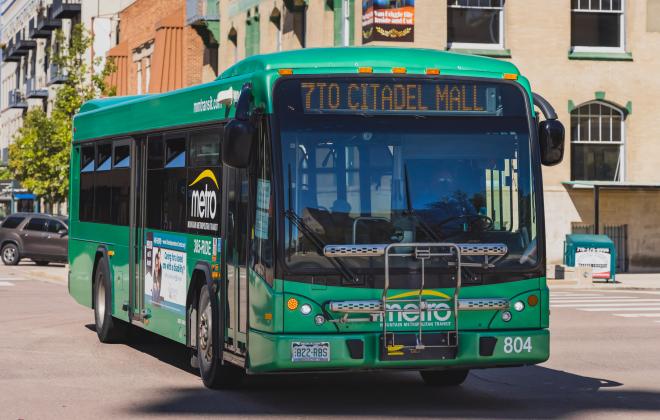 green city bus downtown