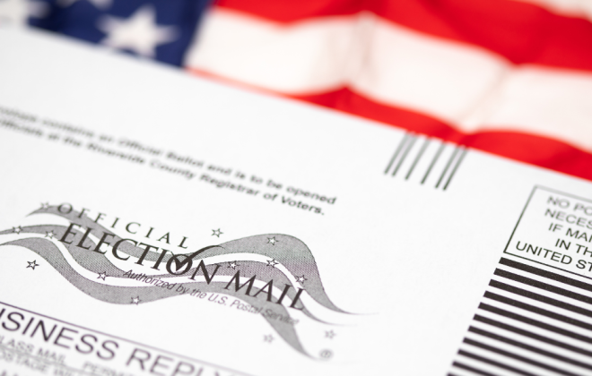 ballot envelope in front of American flag