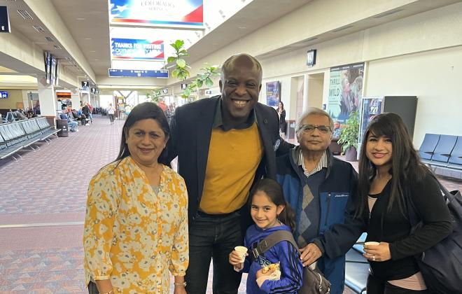 Mayor Yemi greeting travelers at the Colorado Springs Airport