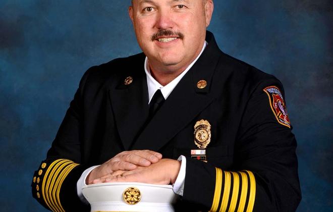 Official Colorado Springs Fire Department headshot of Chief Ted Collas in his dress blues