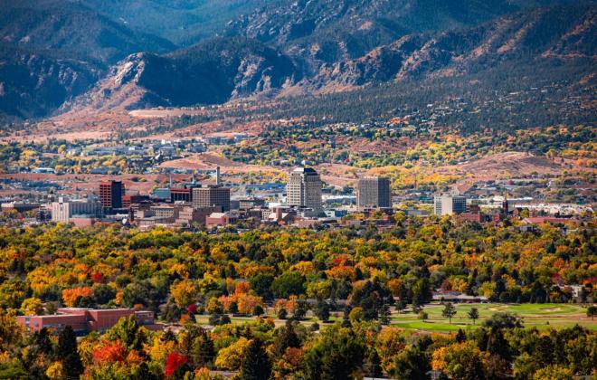autumn colored trees and downtown Colorado Springs 