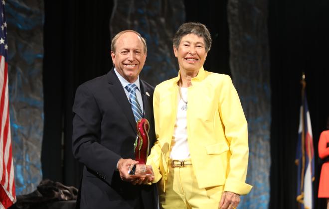 Mayor John Suthers and Lyda Hill with her Lifetime Achievement Award