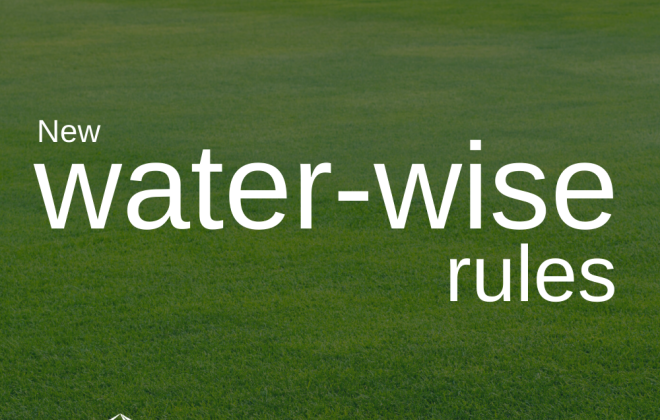 field of green grass. new water-wise rules. city logo