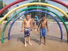 kids playing in the sprayground