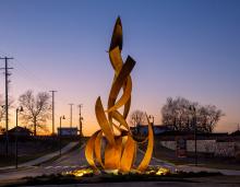 a large metal sculpture of a campfire