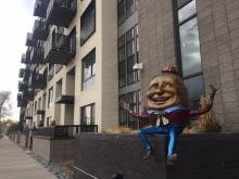 humpty dumpty art outside of downtown apartment complex