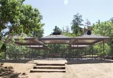 large picnic pavilion in wooded area